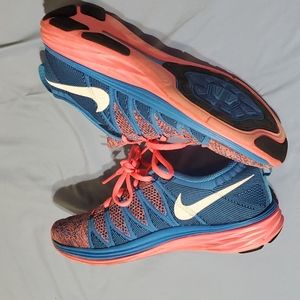 Size 10 Woman's Flyknit Lunar 2 pink and blue. Pet and smoke free home.